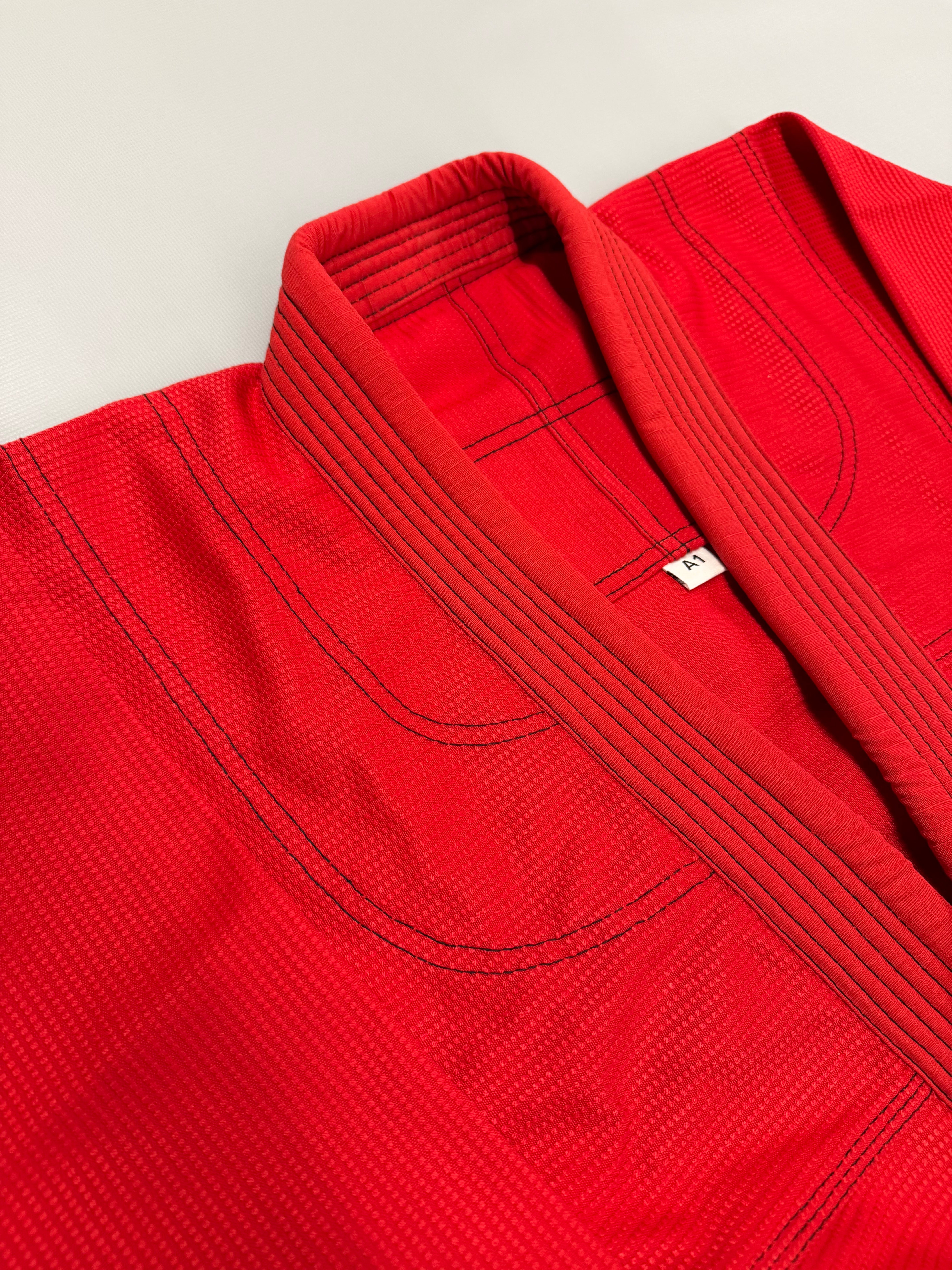 Pearl Weave BJJ Gi – Adult (Red with Black Contrast Stitching)